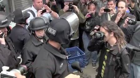 May_1st_general_strike_in_Los_Angeles_Black_Bloc_kettle_the_police_and_force_police_line_back