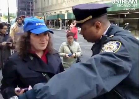 may day general strike protester arrested for walking on sidewalk